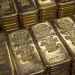 Gold and silver rise from near one-week lows on bargain-hunting