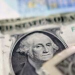 Dollar slides, stocks jump as Trump signals pause on Iran strikes