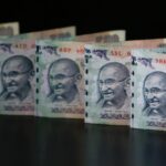 Rupee hits record low as Indian assets drop on worries of escalating Middle East war